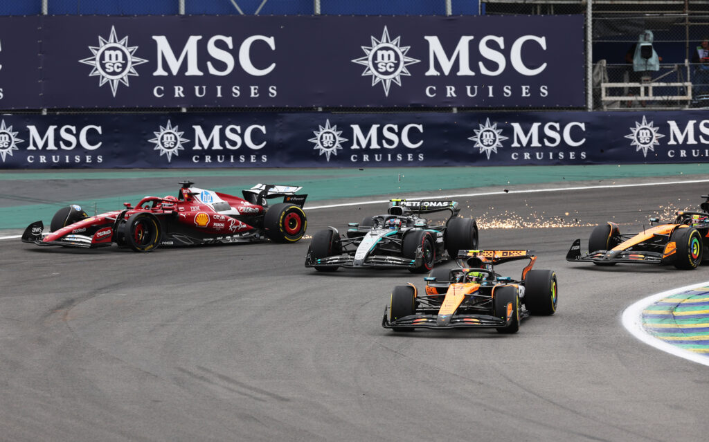 Ferrari driver Charles Leclerc runs wide after being hit at the 2025 Sao Paulo Grand Prix