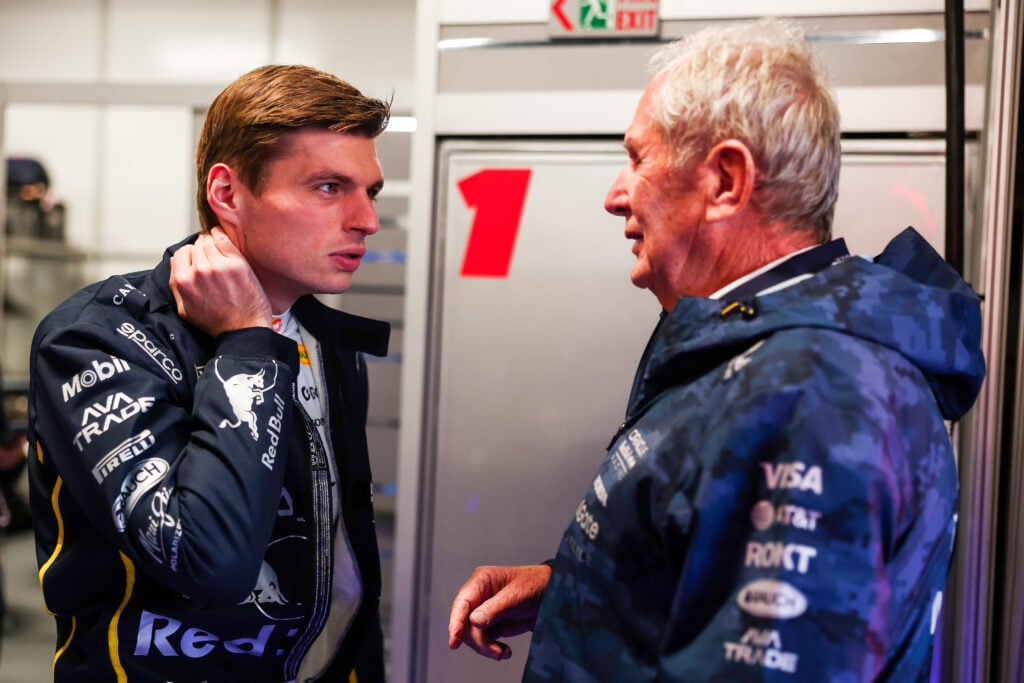 Helmut Marko of Red Bull speaks to Max Verstappen in the Las Vegas Grand Prix garage