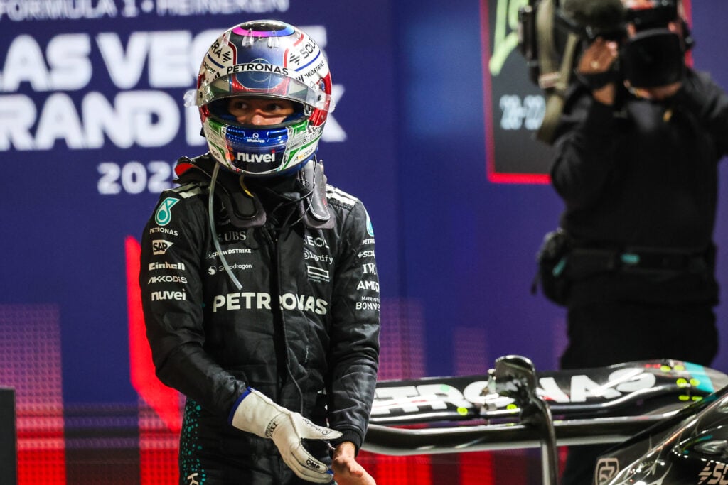 Mercedes driver Andrea Kimi Antonelli removing his gloves at the 2025 Formula 1 Las Vegas Grand Prix