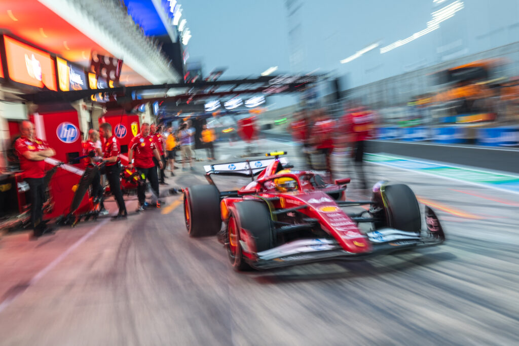 Lewis Hamilton speeds out of the Ferrari pit box during practice for the Qatar Grand Prix