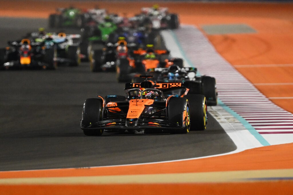 Oscar Piastri leads the field during the Sprint race at the 2025 Qatar Grand Prix