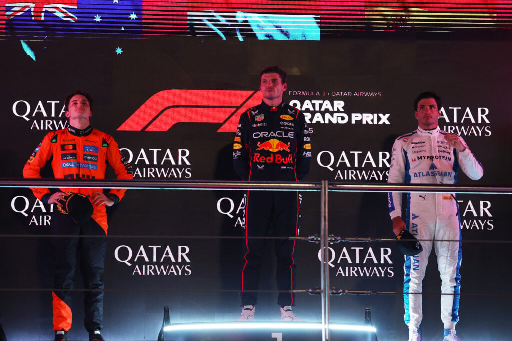 Max Verstappen, Oscar Piastri and Carlos Sainz on the podium at the 2025 Formula 1 Qatar Grand Prix