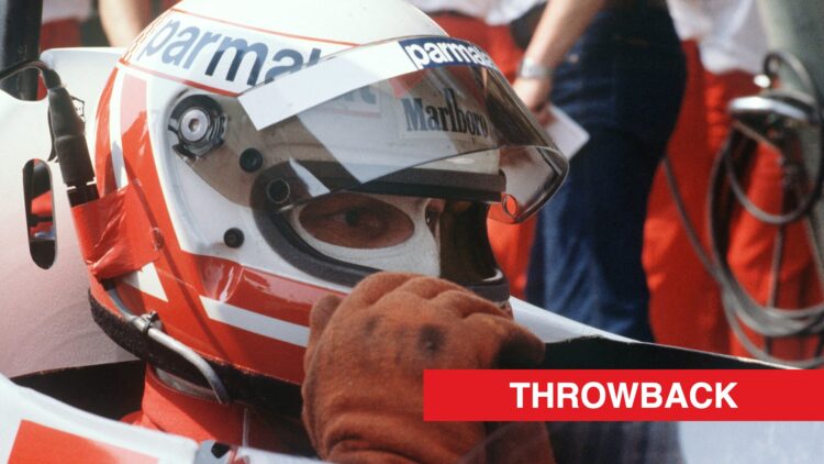 Niki Lauda sat in his McLaren F1 car with his leathers and race helmet on during the 1982 Formula season.