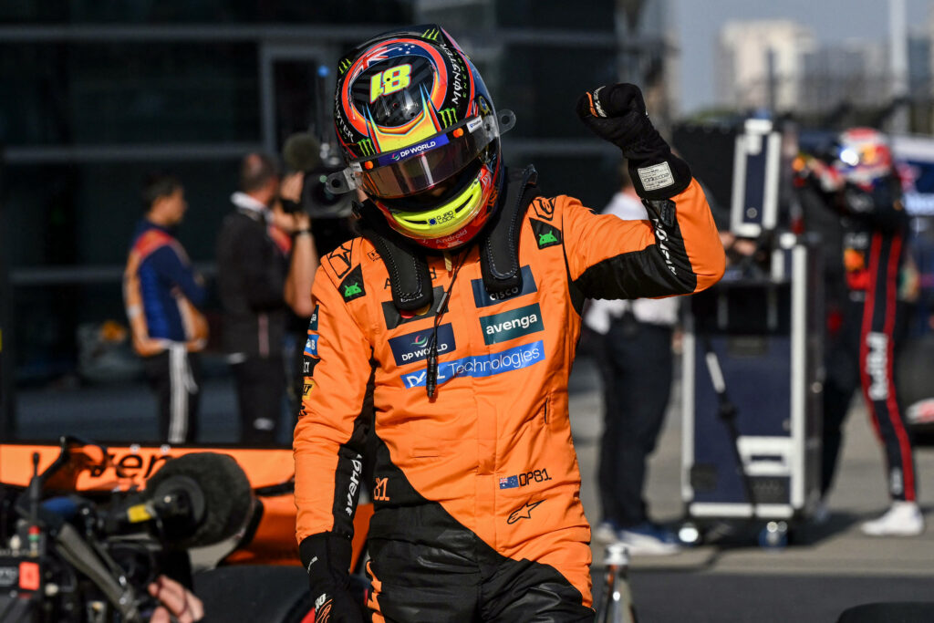 McLaren driver Oscar Piastri celebrates scoring his first F1 career pole position at the 2025 Chinese Grand Prix