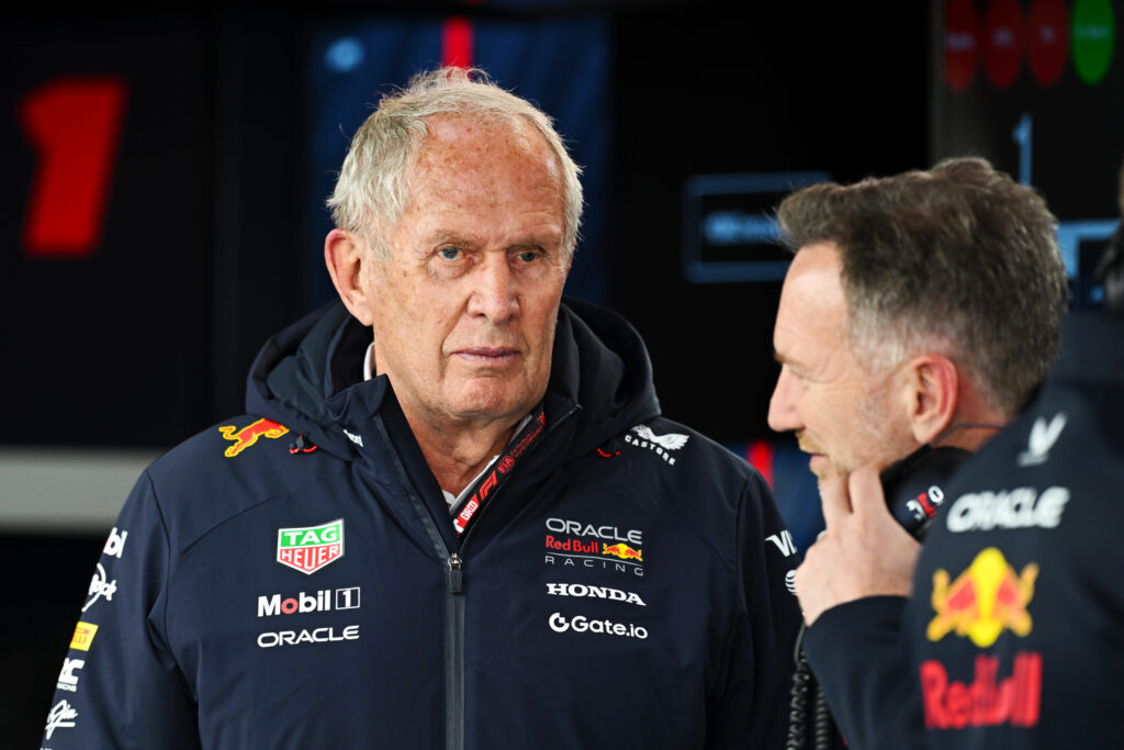 Helmut Marko and Christian Horner inside the Red Bull garage at the 2025 Japanese Grand Prix