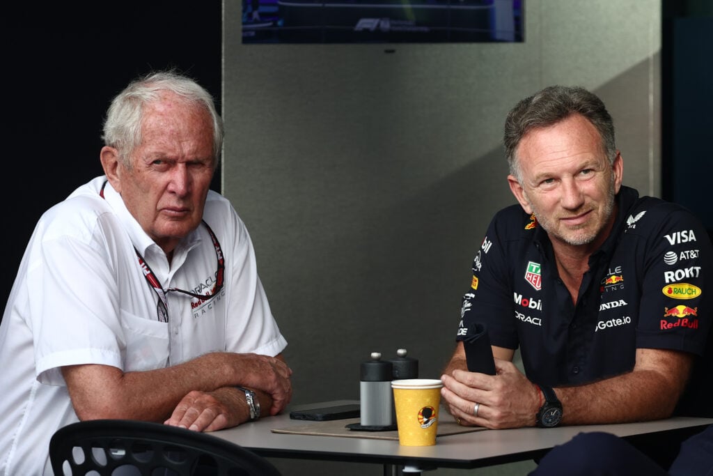 Helmut Marko and Christian Horner sitting at a table together at the 2025 Formula 1 Saudi Arabian Grand Prix
