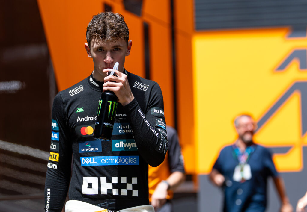 Alex Dunne walking through the paddock at the Formula 2 Austrian Grand Prix