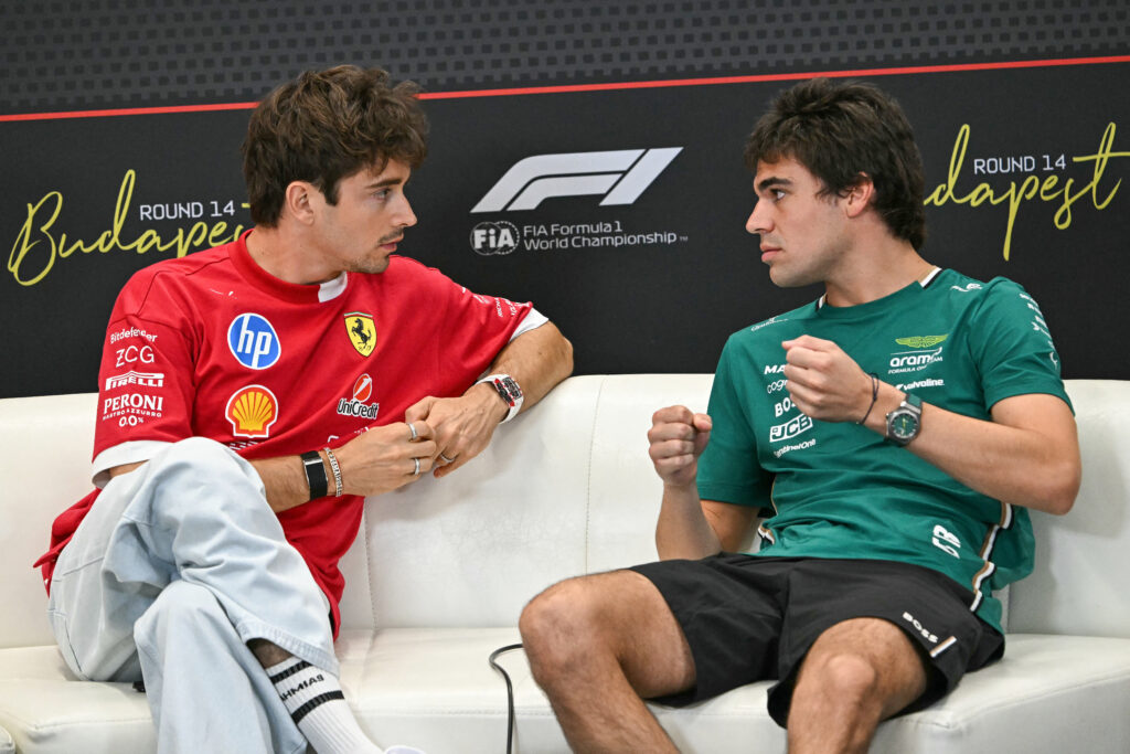 Ferrari driver Charles Leclerc and Aston Martin driver Lance Stroll speaking at the 2025 Formula 1 Azerbaijan Grand Prix