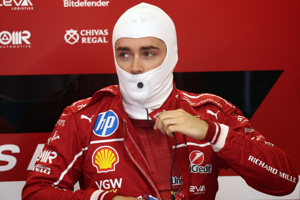 Ferrari driver Charles Leclerc preparing for a race at the 2025 Formula 1 Hungarian Grand Prix