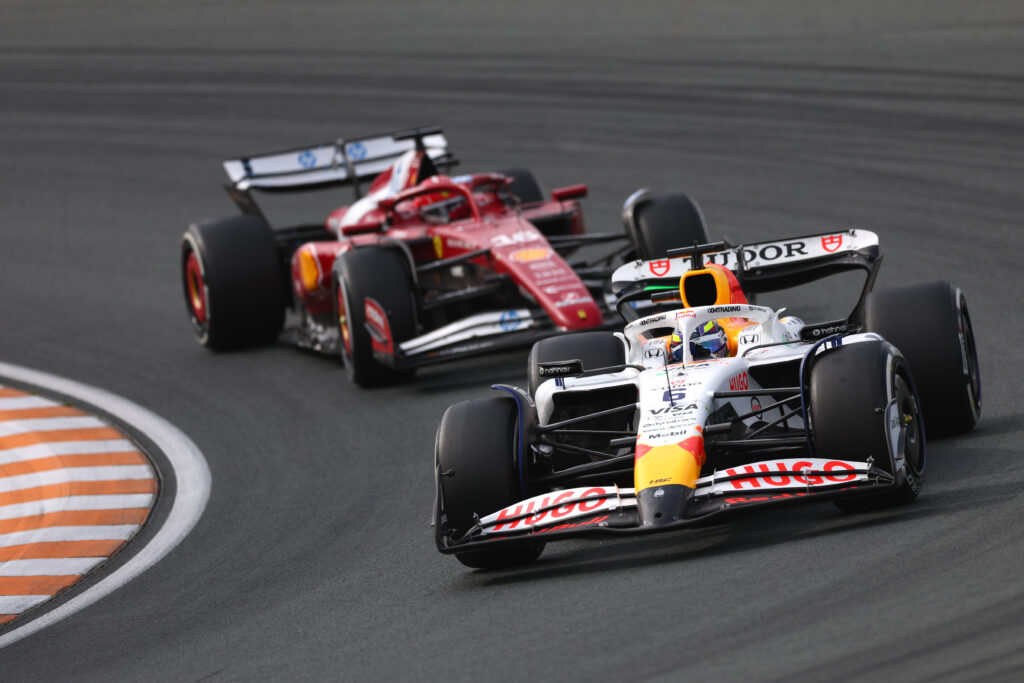 Racing Bulls driver Isack Hadjar racing Ferrari driver Charles Leclerc at the 2025 Formula 1 Dutch Grand Prix