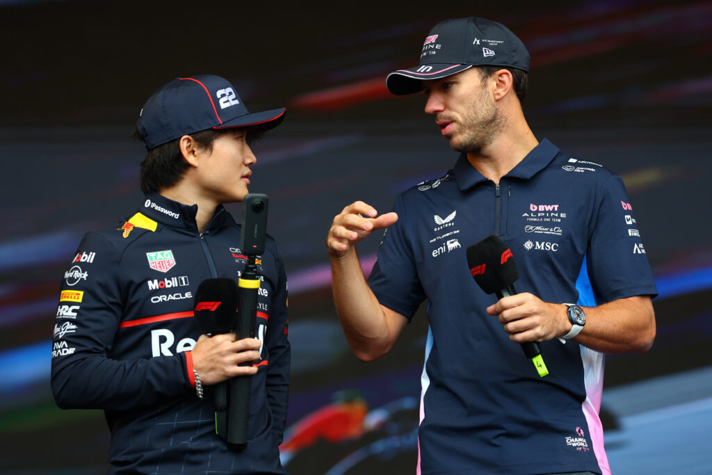 Yuki Tsunoda and Pierre Gasly speaking on stage at the 2025 Formula 1 Azerbaijan Grand Prix
