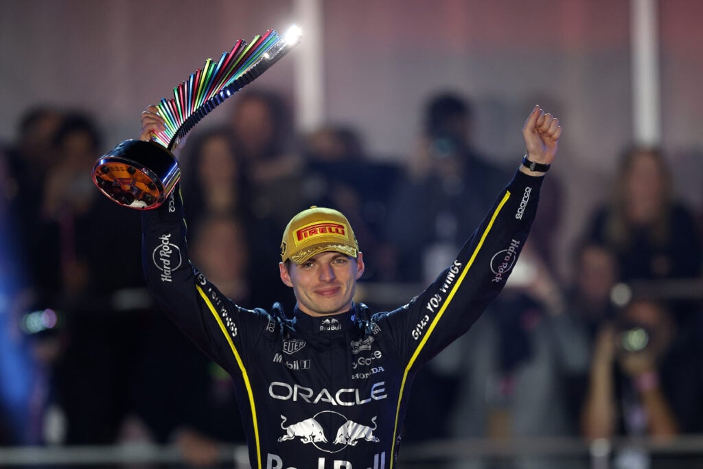 Red Bull driver Max Verstappen lifts a trophy aloft at the 2025 Formula 1 Las Vegas Grand Prix
