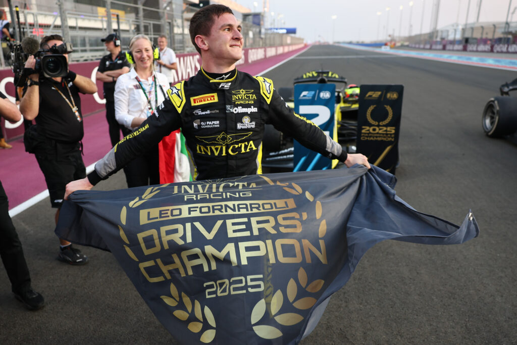 Invicta driver Leonardo Fornaroli celebrating winning the Formula 2 championship in Qatar