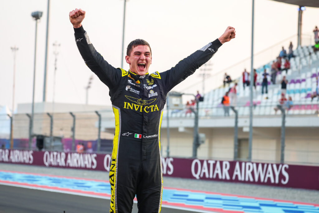 Invicta driver Leonardo Fornaroli celebrating winning the Formula 2 championship at the 2025 Qatar Grand Prix