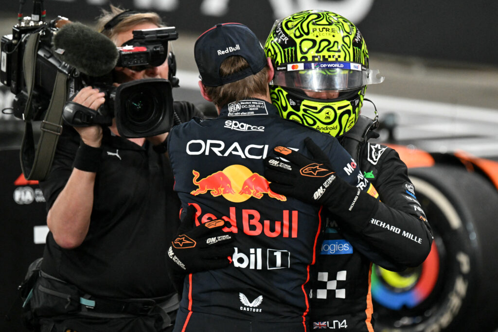 Max Verstappen and Lando Norris embracing after the 2025 Formula 1 Abu Dhabi Grand Prix