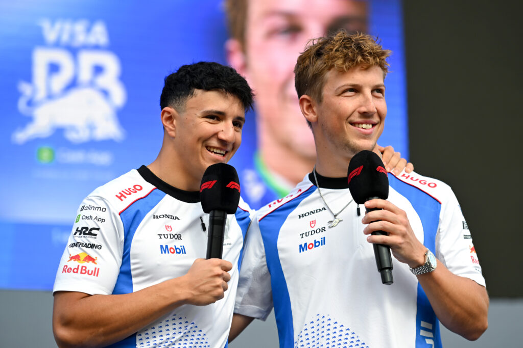 Racing Bulls drivers Isack Hadjar and Liam Lawson speak at an event at the 2025 F1 Abu Dhabi Grand Prix