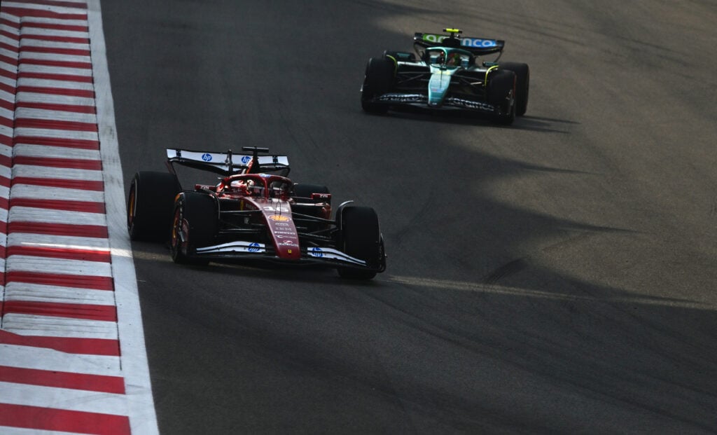 Ferrari driver Charles Leclerc on track with Aston Martin's Cian Shields during practice at the 2025 F1 Abu Dhabi Grand Prix