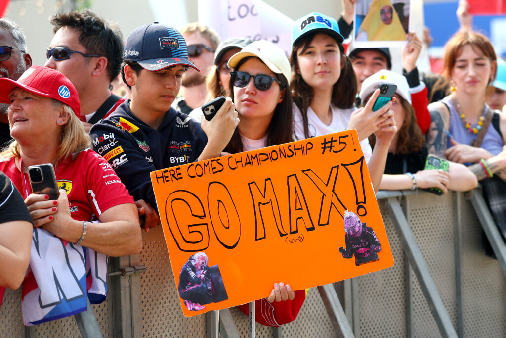 A Max Verstappen fan holding up a sign in support of the Red Bull star during FP3 at the Abu Dhabi Grand Prix.