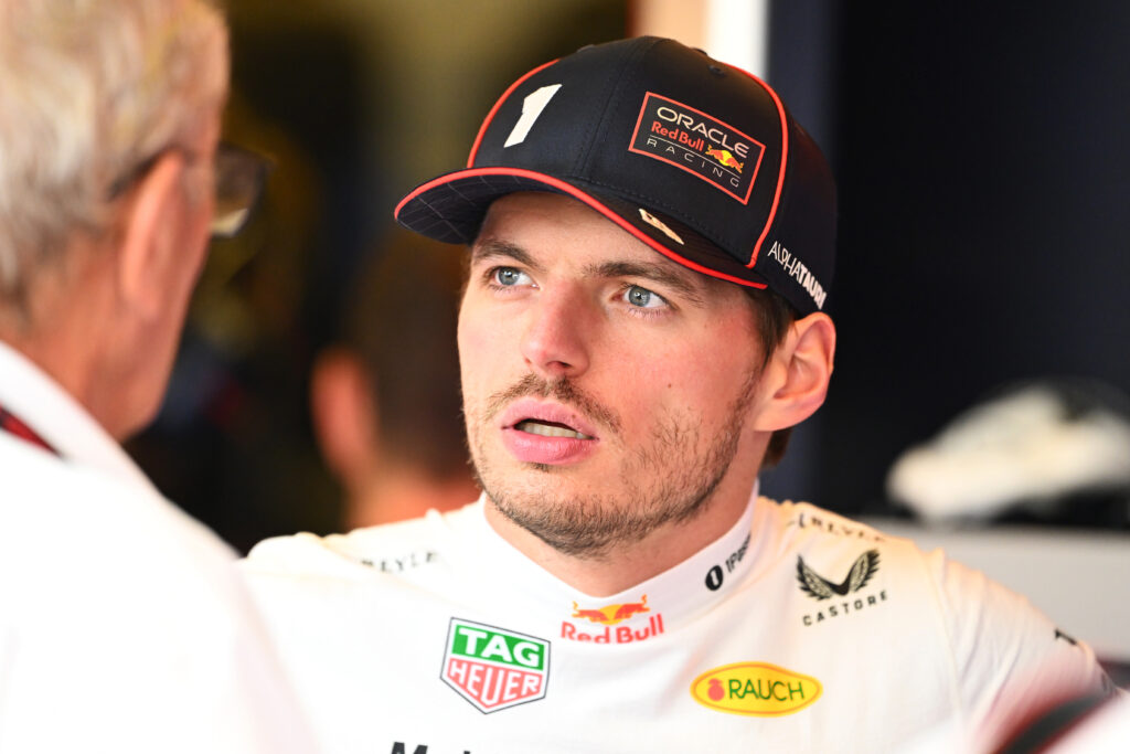 Red Bull driver Max Verstappen speaking to Helmut Marko at the 2025 Formula 1 Abu Dhabi Grand Prix
