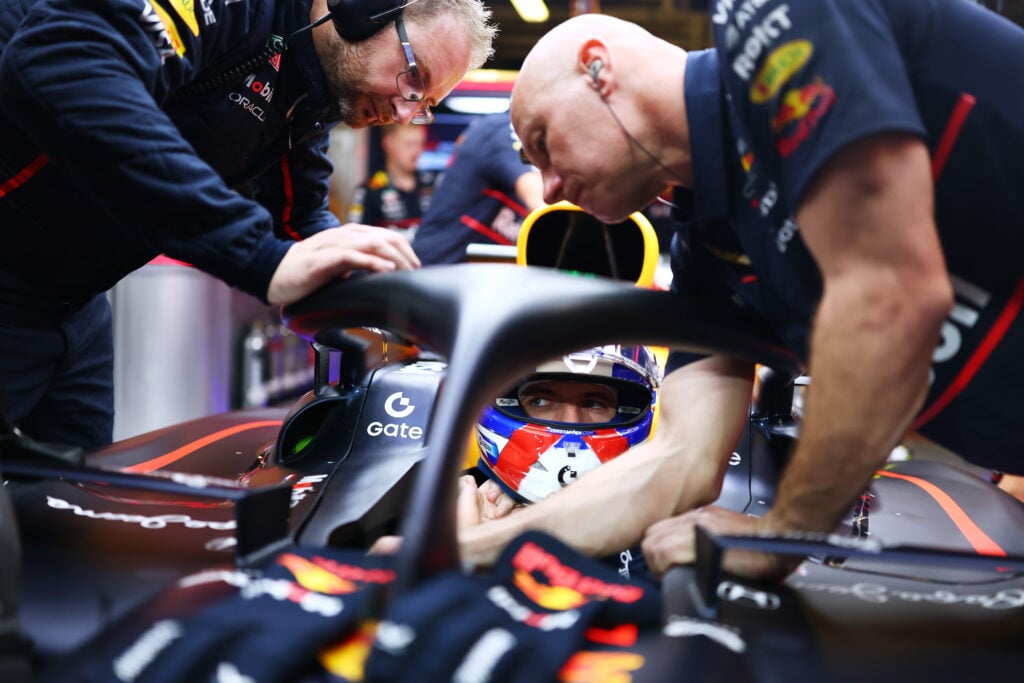 Max Verstappen sitting in his Red Bull car at the 2025 Formula 1 Abu Dhabi Grand Prix