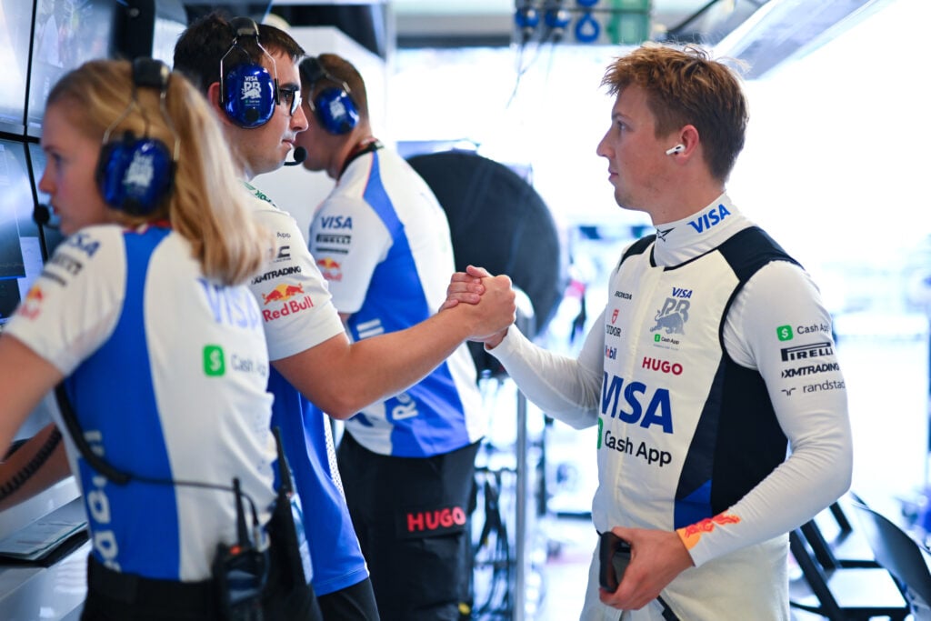 Racing Bulls driver Liam Lawson shakes his engineer's hand before the 2025 F1 Abu Dhabi Grand Prix
