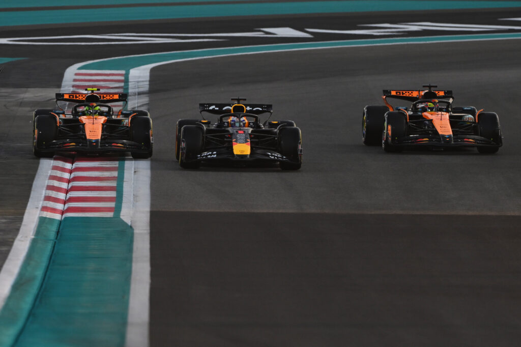 McLaren's Oscar Piastri and Lando Norris on track with Red Bull's Max Verstappen at the start of the 2025 F1 Abu Dhabi Grand Prix