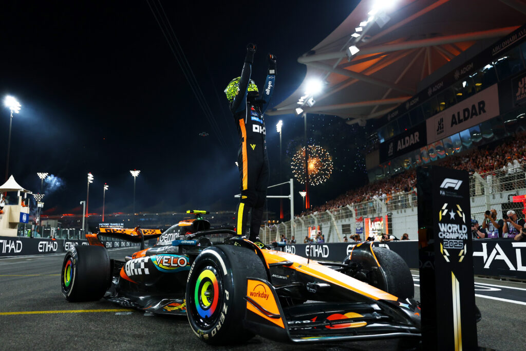 Lando Norris stands on his McLaren after winning the 2025 Formula 1 World Championship