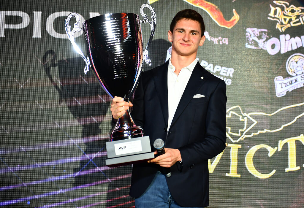 Leonardo Fornaroli collecting his Formula 2 trophy at the FIA Prize Gala