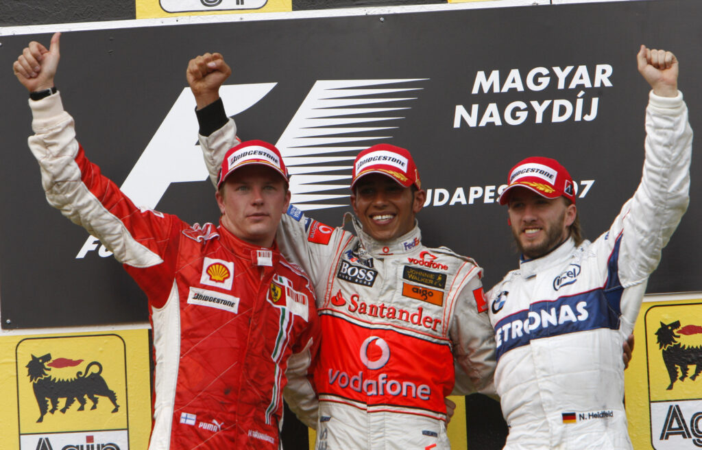 Kimi Raikkonen, Lewis Hamilton and Nick Heidfeld on the podium at the 2007 Hungarian Grand Prix