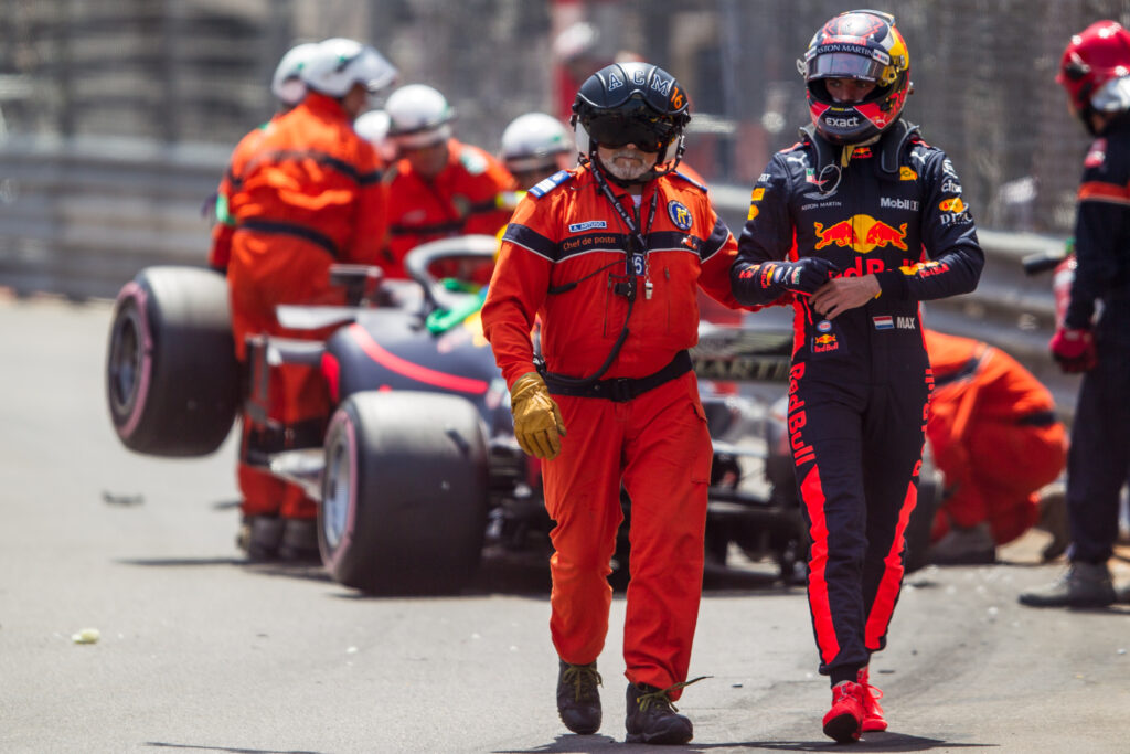 Max Verstappen walking away from his crashed Red Bull at the 2018 Monaco Grand Prix
