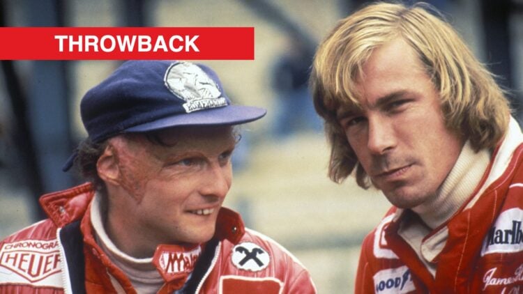 Niki Lauda looking at James Hunt as they converse in the F1 paddock ahead of the 1977 Belgian Grand Prix.