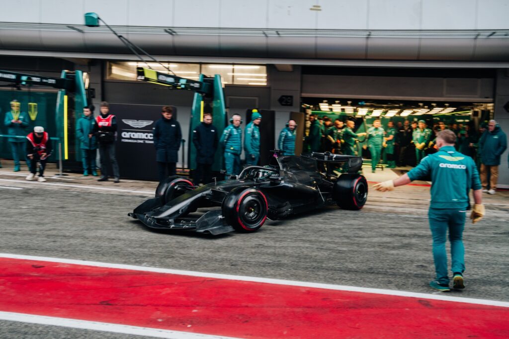 The Aston Martin AMR26 pulls out of the garage for the first time in 2026 at the Barcelona Shakedown