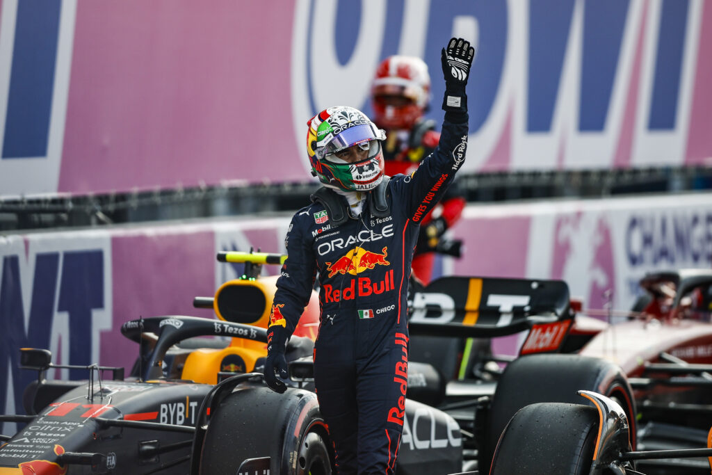 Sergio Perez waves to the crowd in parc ferme at the 2022 Mexico City Grand Prix