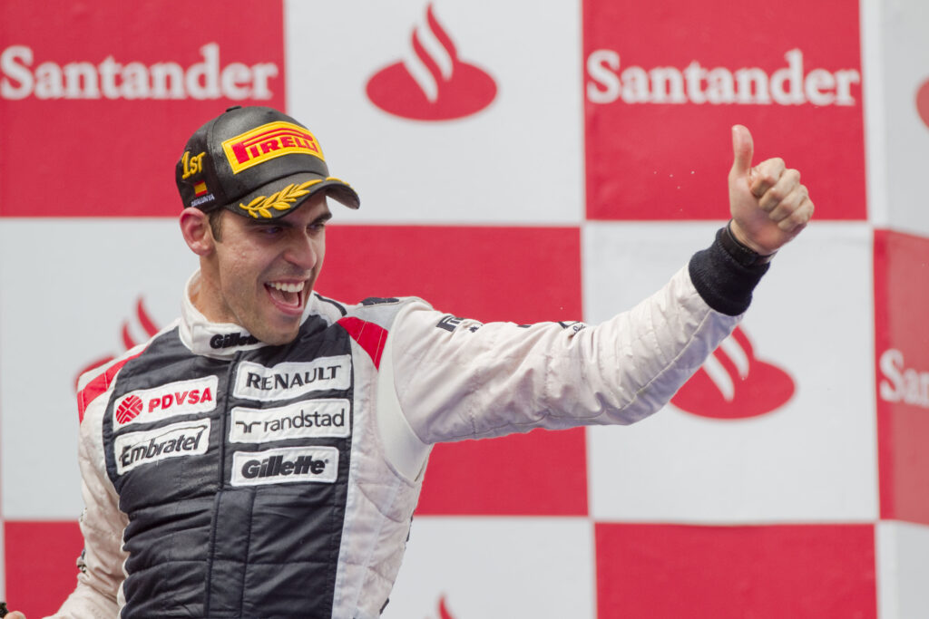 Williams driver Pastor Maldonado on the podium at the 2012 Spanish Grand Prix