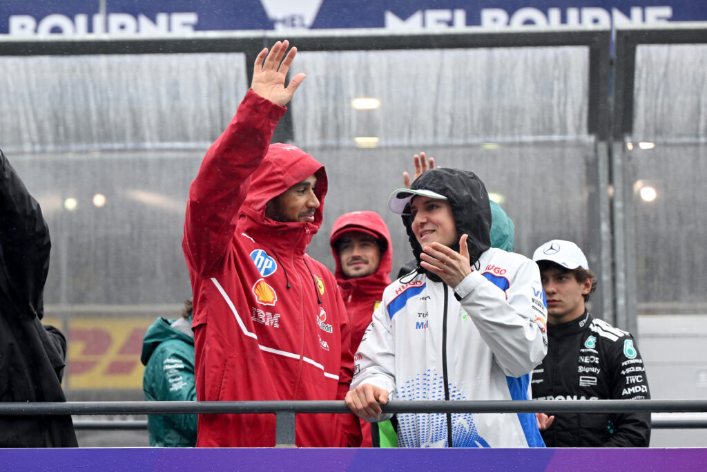 Lewis Hamilton speaking to Isack Hadjar on the driver's parade at the 2025 Formula 1 Australian Grand Prix