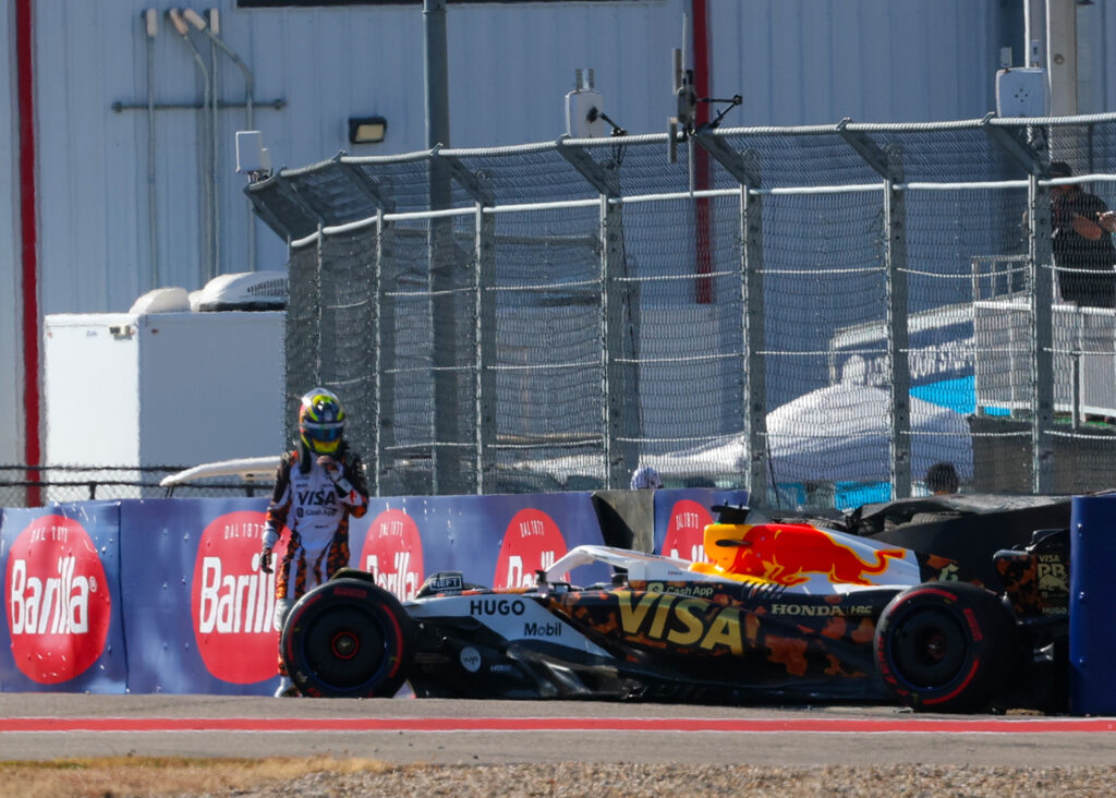 Isack Hadjar looks at his ruined Racing Bulls car after crashing during the qualifying for the 2025 F1 United States Grand Prix