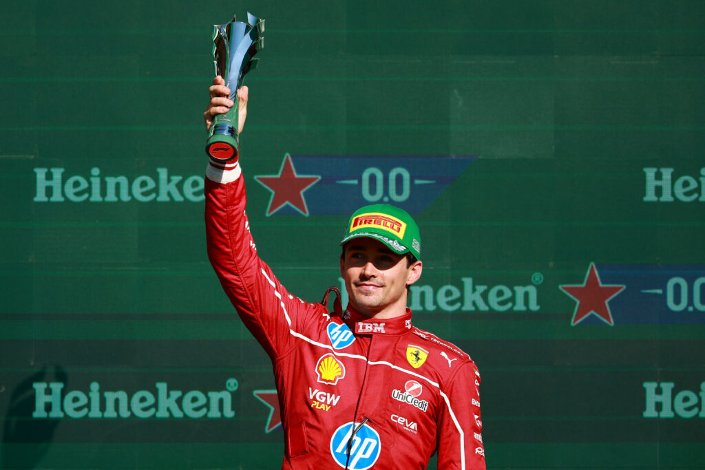 Ferrari driver Charles Leclerc standing on the podium at the 2025 Formula 1 Mexico City Grand Prix