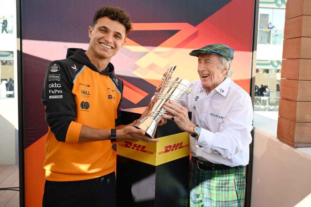 Jackie Stewart awards Lando Norris the 2025 F1 DHL Fastest Lap Award at the Abu Dhabi Grand Prix