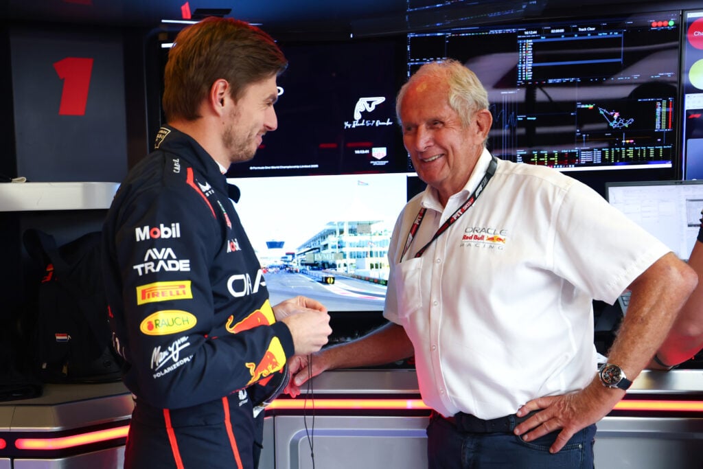 Max Verstappen and Helmut Marko in the Red Bull garage at the 2025 Formula 1 Abu Dhabi Grand Prix