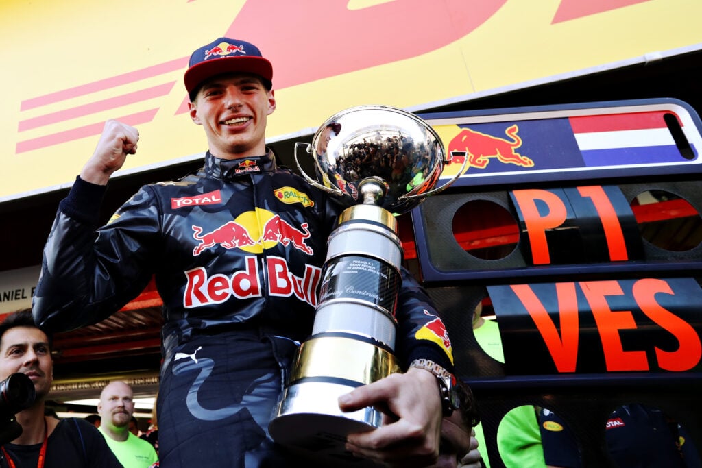 Max Verstappen of Red Bull holds the winner's trophy after the 2016 F1 Spanish Grand Prix
