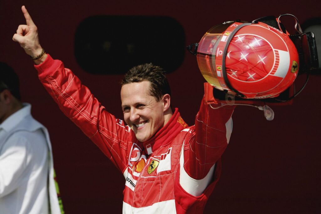 Michael Schumacher celebrates securing pole position for the 2006 San Marino Grand Prix