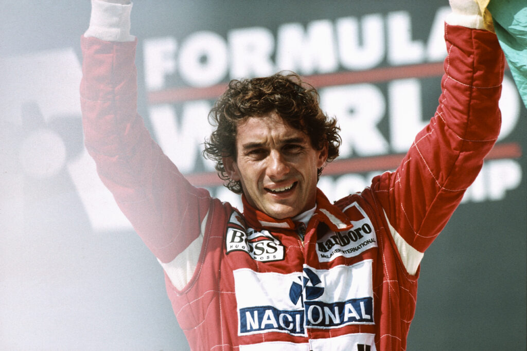 Ayrton Senna stands on the podium during the 1993 Brazilian Grand Prix