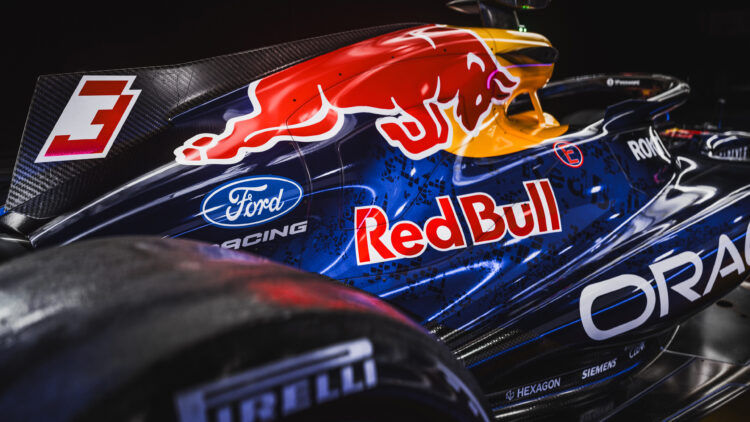 A look at the Ford and Red Bull logos on the engine cover of the Red Bull RB22 at the launch event