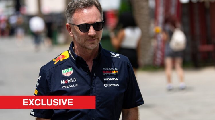 Red Bull team principal Christian Horner walking through the paddock at the 2025 Formula 1 Bahrain Grand Prix