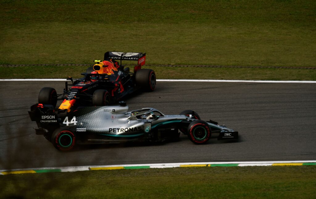 Mercedes' Lewis Hamilton drives away after crashing into Red Bull's Alex Albon in the 2019 F1 Brazilian Grand Prix