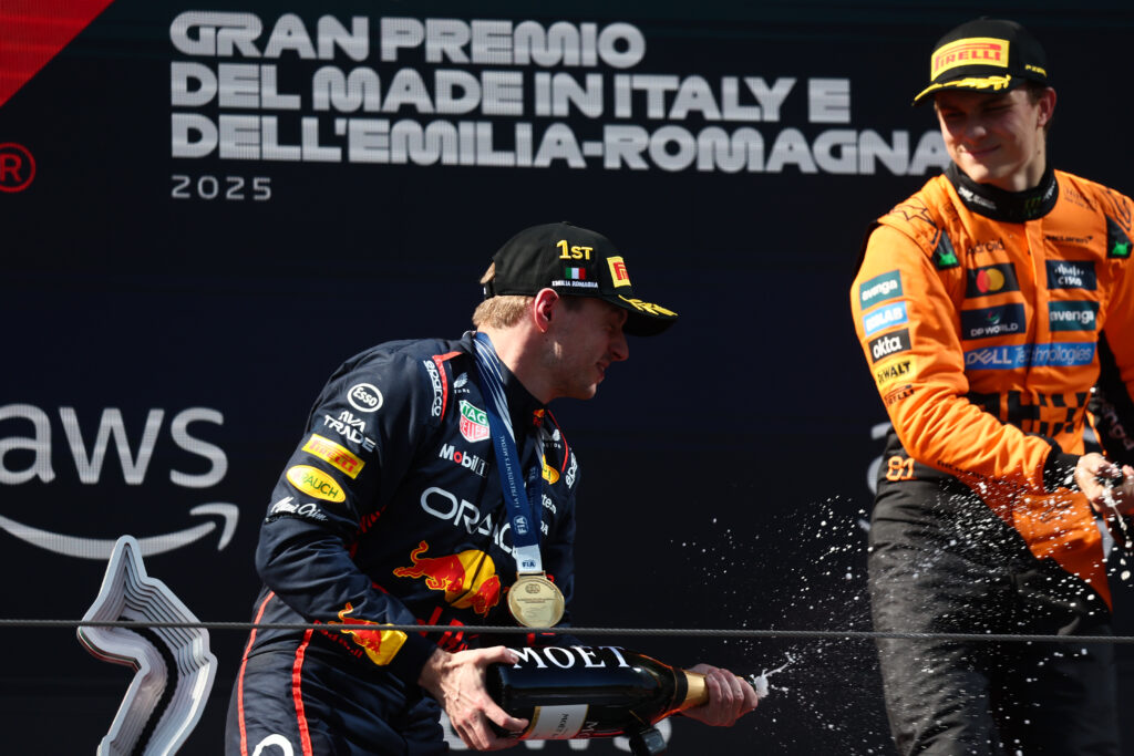 McLaren driver Oscar Piastri and Red Bull driver Max Verstappen on the podium at the 2025 Formula 1 Emilia Romagna Grand Prix