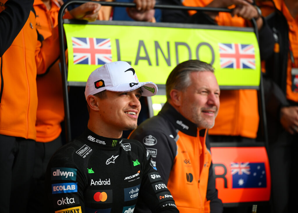 Race winner Lando Norris of Great Britain and McLaren and Zak Brown, Chief Executive Officer of McLaren celebrate with the McLaren team during the F1 Grand Prix of Great Britain at Silverstone Circuit.