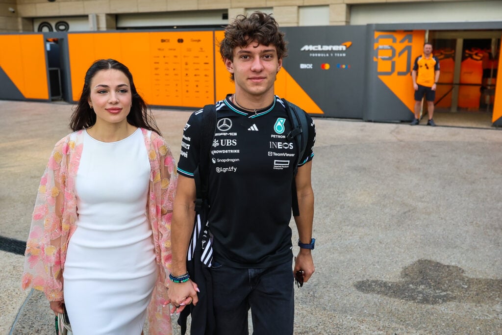 Mercedes driver Kimi Antonelli walks through the paddock with his girlfriend Eliska Babickova at the 2025 Qatar Grand Prix