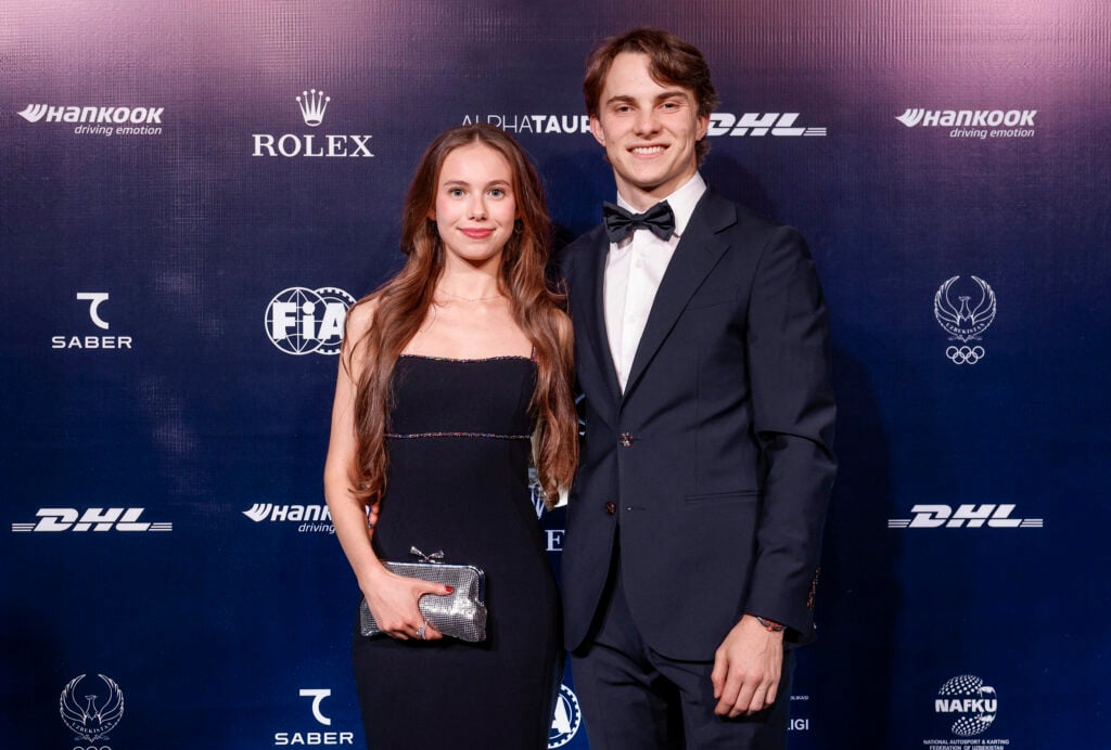 McLaren driver Oscar Piastri and girlfriend Lily Zneimer pose for photos at the 2025 FIA Awards