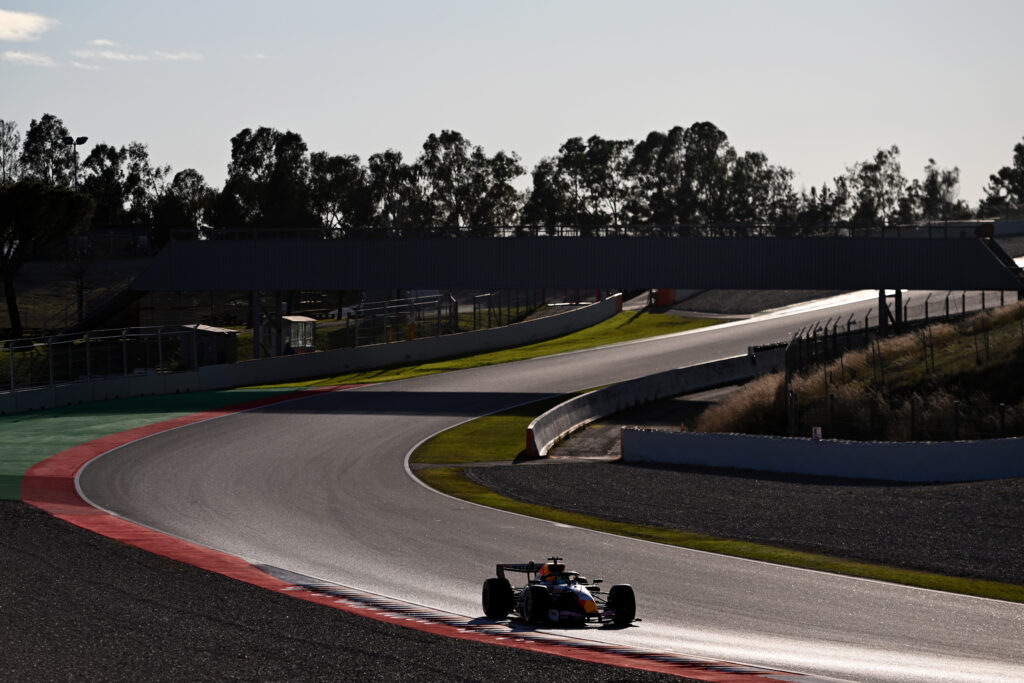 A silhouette of Racing Bulls driver Arvid Lindblad testing at the 2026 Formula 1 shakedown in Barcelona